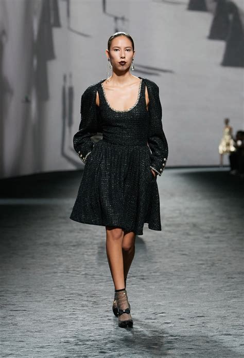 chanel tweed shirt|Chanel black evening gowns.